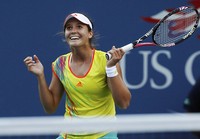 Laura Robson tampak gembira dengan kemenangannya. REUTERS/Eduardo Munoz.