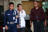 Hasan selalu menutupi mukanya setiap diperiksa KPK dan tidak mau berbicara pada saat diwawancarai wartawan. Ramses/detikcom.