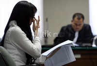 Angie menyimak pembacaan eksepsi yang dibacakan oleh Tim penasihat hukumnya dalam sidang lanjutan di Pengadilan Tipikor, Jl HR Rasuna Said, Jaksel. Ramses/detikcom.