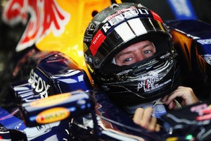 Vettel Sapu Bersih Latihan Bebas