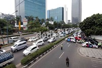 Hingga pukul 11.30 WIB, kondisi masih macet total.