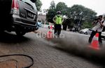 Knalpot Berasap Hitam Pekat Disisir