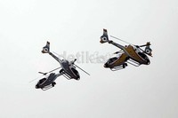 Empat helikopter TNI melakukan manuver.