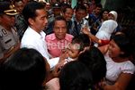 Jokowi Sapa Warga Pinggir Kali Ciliwung