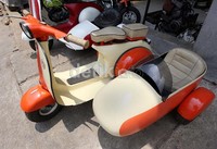 Vespa mini ini dibuat dari bahan baku plat dan bermesin parutan kelapa.