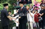 Jokowi Serahkan Jenazah Wiyogo ke TNI