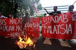 Kecam Pemerkosaan TKI, Bendera Malaysia Dibakar