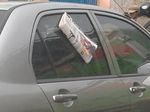 Koran Tempel di Mobil