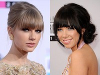 Taylor Swift dan Carly Rae Jepsen kompak tampil berponi rata. Carly pun tampak simple dengan menggulung rambutnya ke samping. Jason Merritt/Getty Images.