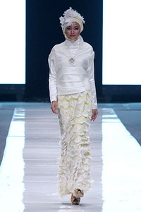 Irna Mutiara The Canary. Jakarta Fashion Week 2013 at Plaza Senayan. Jakarta. [Foto: Mohammad Abduh/Wolipop]