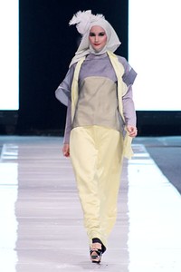 Irna Mutiara The Canary. Jakarta Fashion Week 2013 at Plaza Senayan. Jakarta. [Foto: Mohammad Abduh/Wolipop]