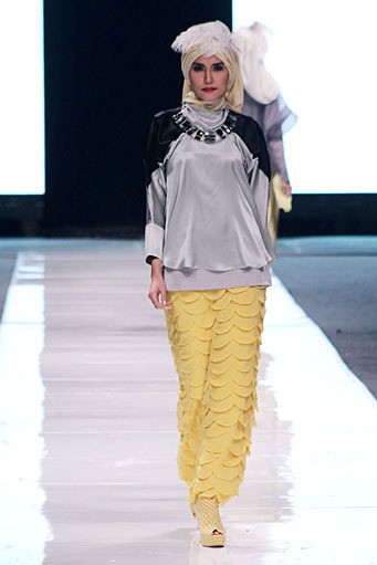 Irna Mutiara The Canary. Jakarta Fashion Week 2013 at Plaza Senayan. Jakarta. [Foto: Mohammad Abduh/Wolipop]