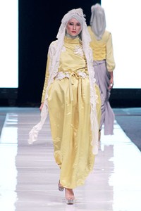 Irna Mutiara The Canary. Jakarta Fashion Week 2013 at Plaza Senayan. Jakarta. [Foto: Mohammad Abduh/Wolipop]