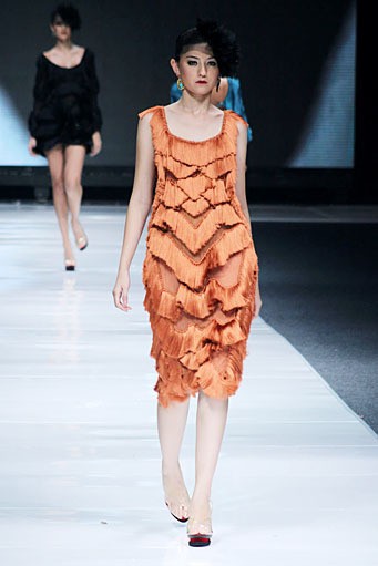 Oscar Lawalata Couture 2013 My Name is 20S. Jakarta Fashion Week 2013 at Plaza Senayan. Jakarta. [Foto: Mohammad Abduh/Wolipop]