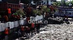Sampah di Kali Sunter Dibersihkan