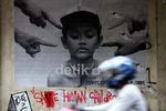 Mural Sambut Hari Anti Korupsi dan HAM Sedunia