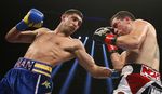 Amir Khan Menang TKO dari Molina