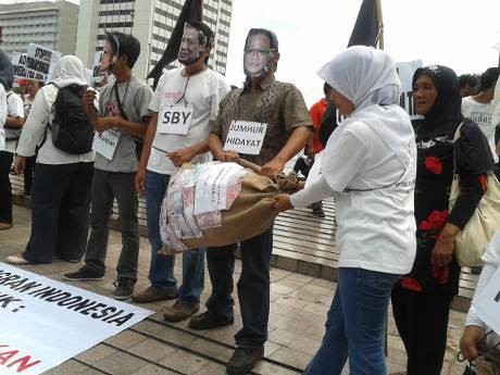 Migrant Care Gelar Aksi Sindir SBY, Muhaimin & Jumhur di Bundaran HI