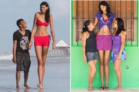 Saat berjalan di pantai bersama pacarnya, Elisany da Cruz Silva terlihat seperti sedang menggandeng anak kecil yang tingginya tak sampai sedada Elisany. Tinggi badan sang pacar, Francinaldo da Silva Carvalho (22 tahun) tergolong normal, yakni 163 cm. Yang justru tak normal adalah Elisany, karena ia mengalami gigantisme. Untuk mencium pacarnya, Elisany harus selalu membungkuk. (Foto: Barcroft)
