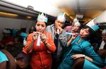 Perayaan Tahun Baru di Dalam Pesawat Garuda