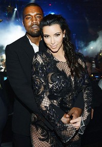 Kim dan Kanye merayakan tahun baru bersama. (WireImage; Daily Mail)