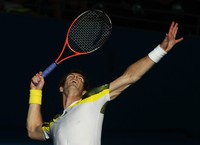 Bertanding di Queensland Tennis Center, Jumat (4/1/2013), Murray menjalani pertandingan keduanya dengan lebih mudah ketimbang laga pertamanya saat harus bermain tiga set melawan petenis kualifikasi John Millman.REUTERS/Daniel Munoz.