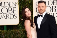 Megan berpose dengan sang suami, Brian Austin Green. (Getty/Jason Merritt).