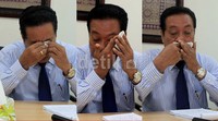Foto-foto Daming saat menangis.