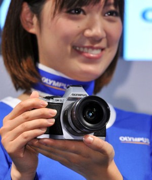 Olympus & Canon Berjaya di Kandang