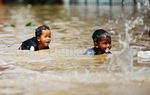 Banjir Jadi Arena Bermain
