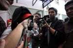 Jalani Sidang Pembunuhan, Doyok Cengengesan