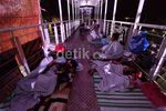 Korban Banjir Mengungsi di Halte TransJ