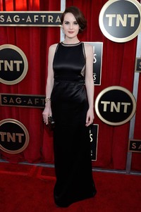 Michelle Dockery tampak elegan dalam balutan dress Chado Ralph Rucci. Kevork Djansezian/Getty Images.