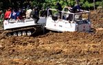 Hagglund PMI Evakuasi Korban Longsor Agam