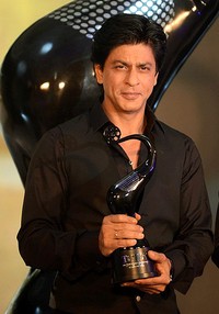 Meskipun sudah berusia 47 tahun, Shahrukh Khan tetap terlihat tampan. AFP/Punit Paranjpe.