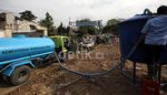 Korban Banjir Dapat Bantuan Air Bersih