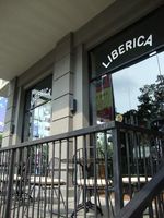 Laptop, Kopi, dan Cake di Liberica