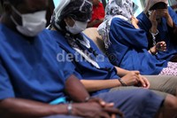 Para tersangka terus menunduk saat dihadirkan dalam pemusnahan barang bukti tersebut.