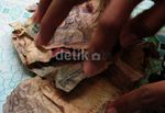 Memberantas Uang Tak Layak di Papua