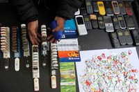 Polisi juga menyita 26 handphone, 70 buah modem, 8 unit laptop, ratusan sim card.