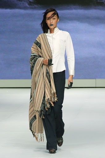 Jakarta, Indonesia - 14 Februari. KRATON by Auguste SoesastroAutumn Winter 2013 - 2014. Indonesia Fashion Week 2013 at Jakarta Convention Center. 14 Februari 2013. Jakarta. [Foto: Mohammad Abduh/Wolipop]