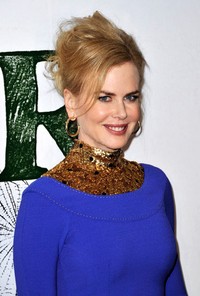 Nicole tersenyum di depan kamera. Gareth Cattermole/Getty Images.