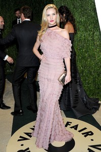 Rosie tampil mempesona. Pascal Le Segretain/Getty Images.