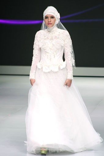 Misan Kopaka Western Romanticism. Fashion Show Parade INFINITELY COVERED. Indonesia Fashion Week 2013 at Jakarta Convention Center. 15 Februari 2013. Senayan. Jakarta. [Foto: Mohammad Abduh/Wolipop]