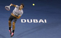Sebelumnya petenis asal Swiss tersebut, berhasil mengalahkan petenis Rusia Nikolay Davydenko, 6-2, 6-2. REUTERS/Jumana El Heloueh.