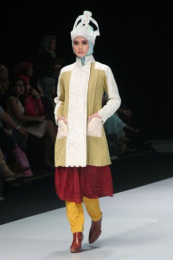 Jakarta, Indonesia - 15 Februari. Nuniek Mawardi The Kingdom. Explore Minangkabau Herritage. Indonesia Fashion Week 2013 at Jakarta Convention Center. 15 Februari 2013. Senayan. Jakarta. [Foto: Mohammad Abduh/Wolipop]
