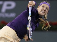 Azarenka harus bertarung selama 1 jam 46 menit di Indian Wells Tennis Garden, Selasa (12/3/2013) siang WIB oleh Kirsten Flipkens. REUTERS/Danny Moloshok.
