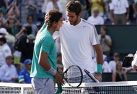 Rafael Nadal sempat tertinggal lebih dulu sebelum kemudian memetik kemenangan atas Juan Martin del Potro. REUTERS/Danny Moloshok.