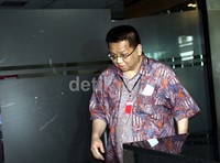 Frans Guna Wijaya memasuki gedung KPK. Ramses/detikFoto.