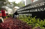 Aksi Meruwat Kemenkopolhukam